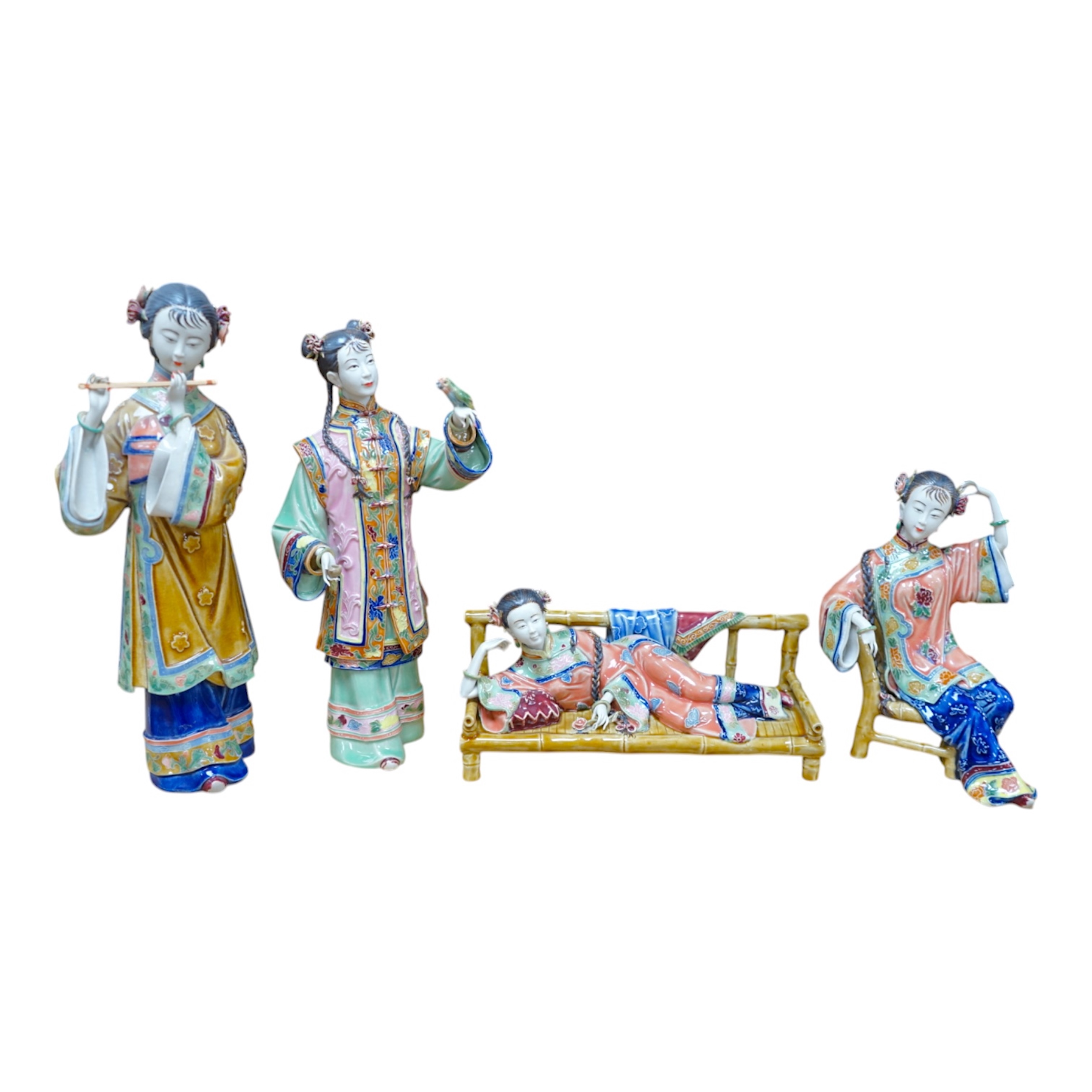 Four Chinese porcelain figures of ladies, tallest 31.5cm. Condition - good.